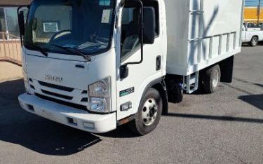Photo of a 2015 Isuzu NPR 12FT Chipper Truck for sale