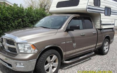 Photo of a 2010 RAM 1500 With Six-Pac Camper for sale