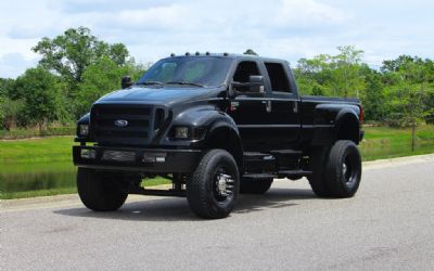 Photo of a 2012 Ford F750 Night Ride Edition Crew Cab Custom Diesel Dually Blacked Out, Air Ride for sale