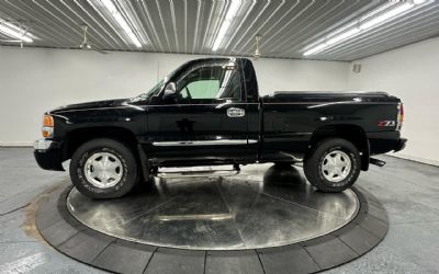 Photo of a 2004 GMC Sierra 1500 4WD Reg Cab 119.0" SLE for sale