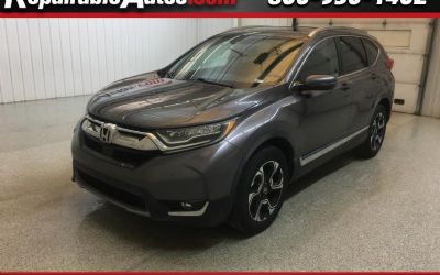 Photo of a 2019 Honda CR-V Touring AWD Repairable Hail Damage for sale