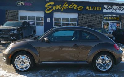 Photo of a 2012 Volkswagen Beetle 2.5L Pzev 2DR Coupe 6A W/ Sunroof, Sound And Navigation for sale
