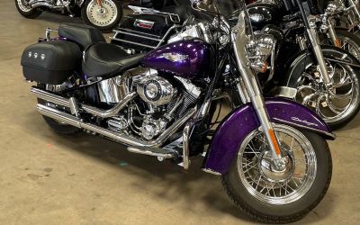 Photo of a 2014 Harley Davidson Softail Deluxe Flstn Hard Candy Voodoo Purple Flake for sale