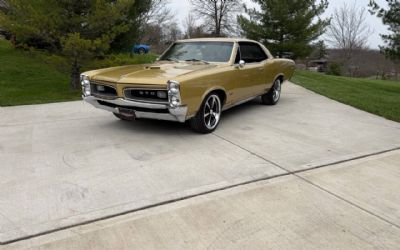 Photo of a 1966 Pontiac GTO 242 Factory GTO 400 4SPD PS PDB for sale