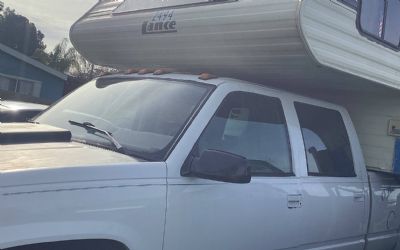 Photo of a 1993 Chevrolet 3500 With Truck Camper for sale