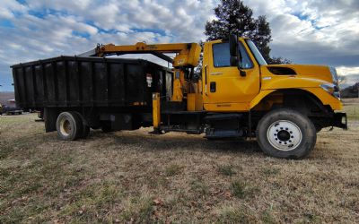 Photo of a 2011 Petersen TL3 Lightning Loader Grapple Truck for sale